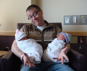 jerry mahoney holding his newborn twins